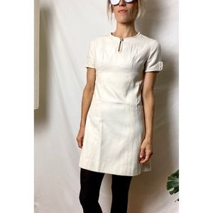 White mod scooter dress with cut out details.
